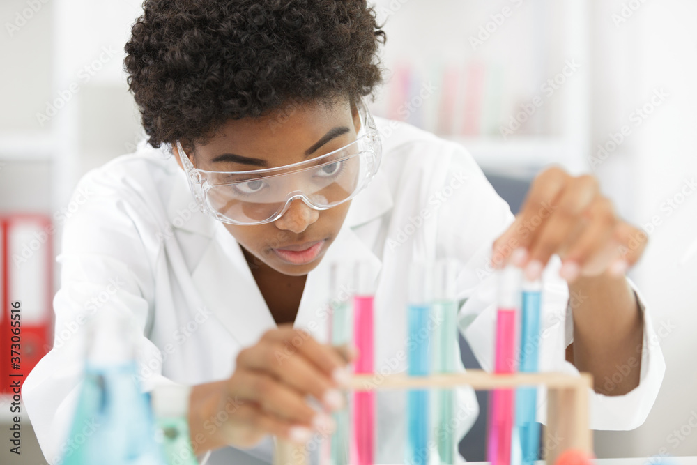 female lab worker doing tests in a laboratory female lab worker doing tests in a laboratory