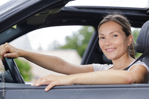 happy pleasant in her car