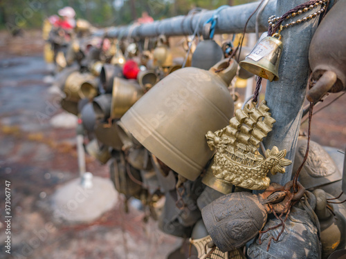 Buddha bell on LanPresrinakarin on top of Phu Kradueng mountain  in Loei City Thailand.Phu Kradueng mountain national park the famous Travel destination photo