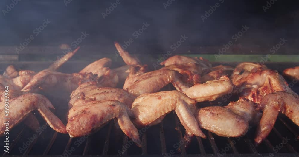 bbq chicken cooking on barbecue grill bbq chicken cooking on barbecue grill