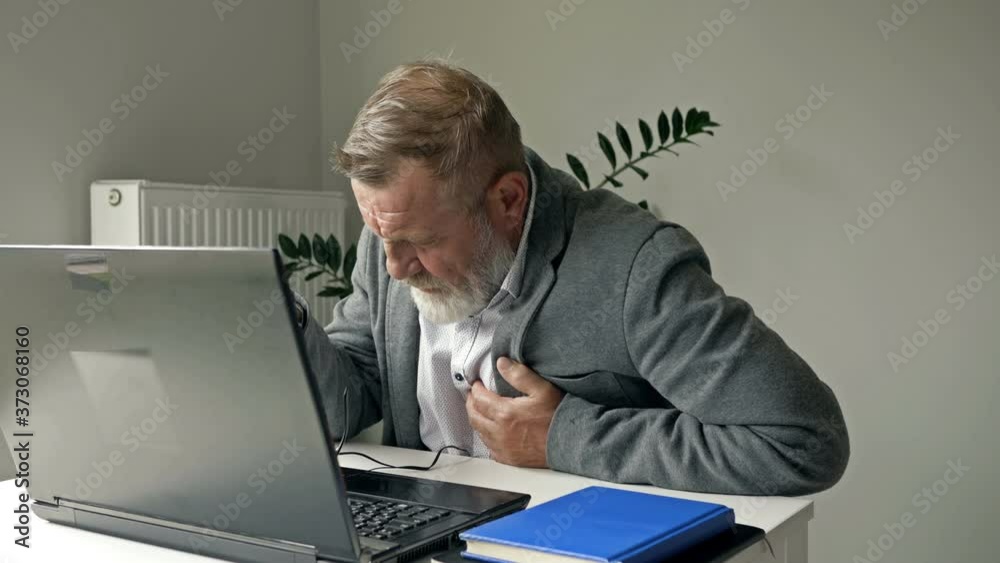 Elder businessman got a health problem. Heart attacked on workaholic businessman. Concept of health care and work life balance. Elder businessman got a health problem. Heart attacked on workaholic businessman. Concept of health care and work life balance.