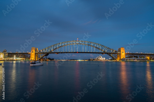 Sydney Opera House and Harbour Bridge during Sunset © Tom