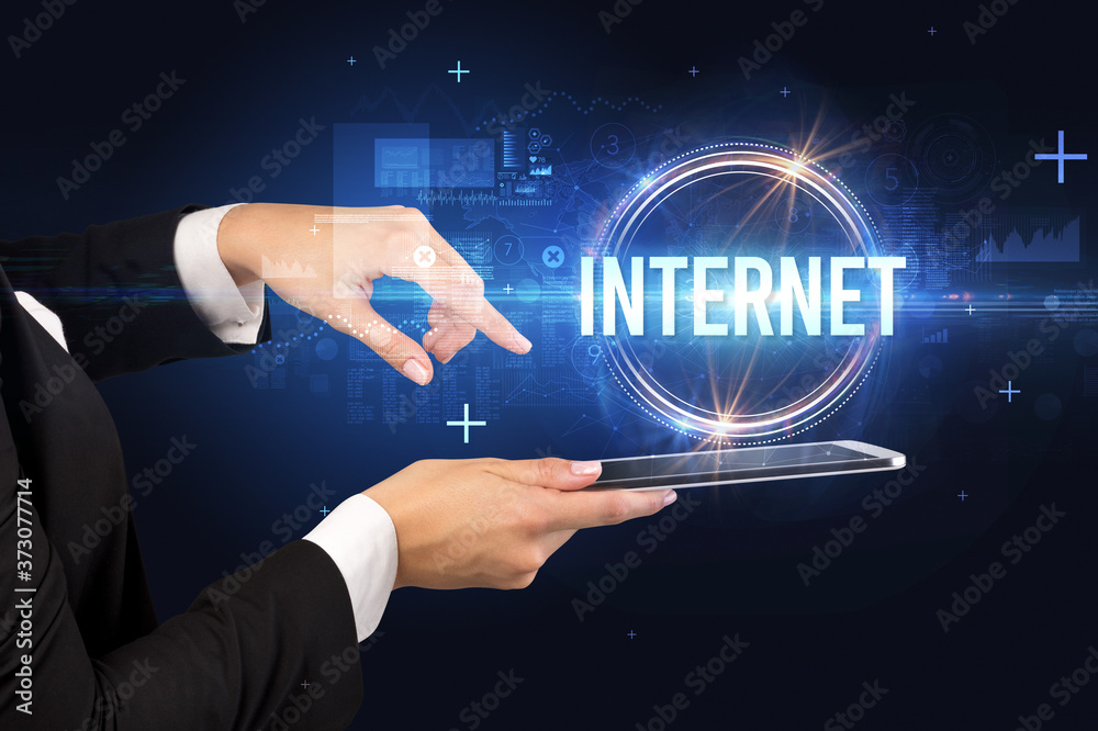 Close-up of a touchscreen with INTERNET inscription, new technology concept Close-up of a touchscreen with INTERNET inscription, new technology concept