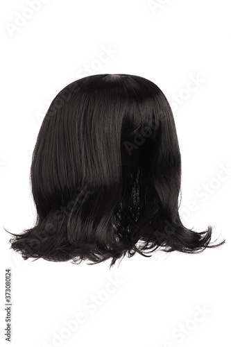 Subject shot of a natural looking black wig with bangs. The shoulder-long wig with twisted strands is isolated on the white background. 