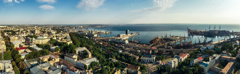 air panorama city center and sea port in Odessa, Ukraine. Drone footage at sunny day