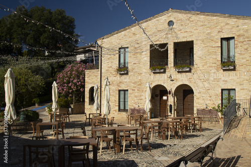 Outdoor cafe in a farmhouse in Monteoprandone, Italy photo