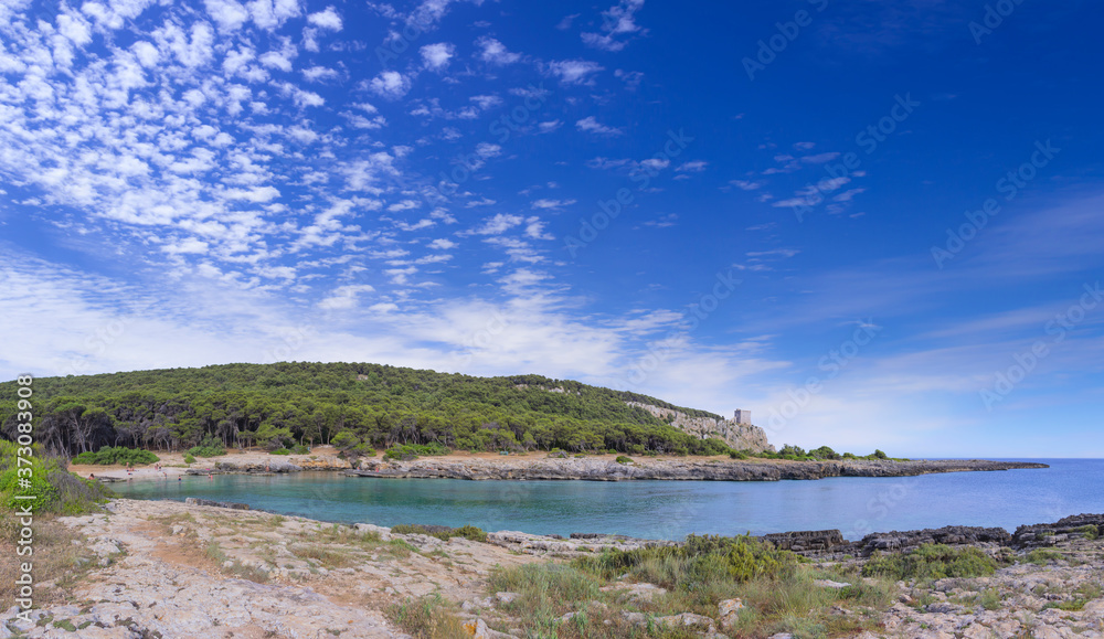 The best beach in Apulia: Porto Selvaggio Beach. Salento coast: view of the Regional Natural Park Porto Selvaggio and Palude del Capitano in Puglia (Italy) with rocky coast and Mediterranean scrub.