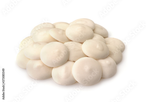 Pile of white chocolate buttons