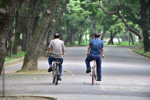 Wallpaper Mural Korean Old Men Riding Bicycles in the Park Torontodigital.ca