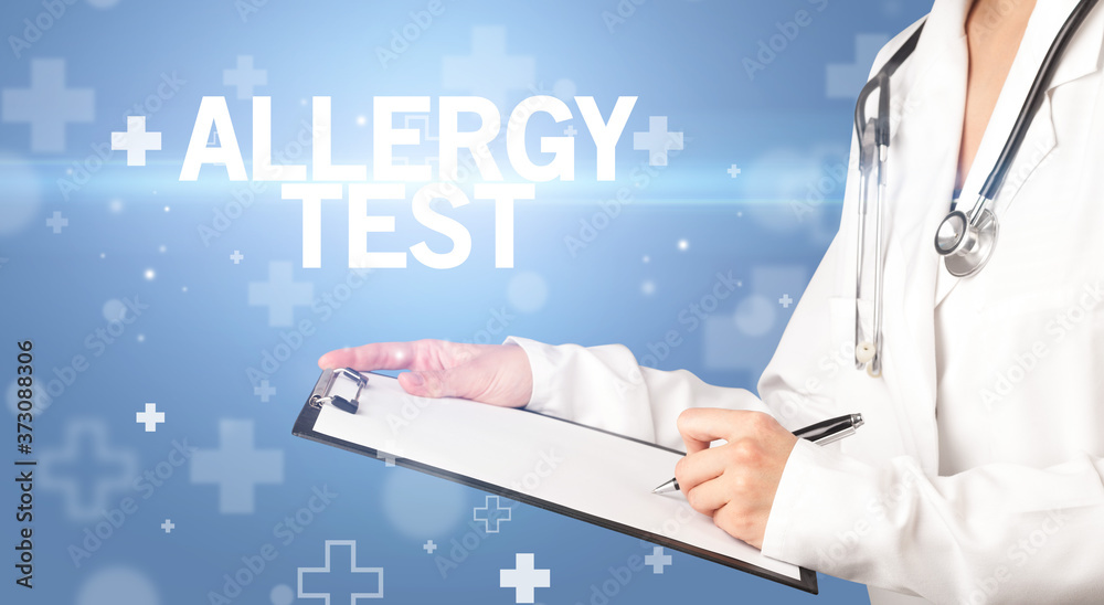 doctor writes notes on the clipboard with ALLERGY TEST inscription, first aid concept doctor writes notes on the clipboard with ALLERGY TEST inscription, first aid concept