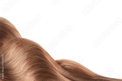 Brown shiny hair isolated on white. Background with copy space