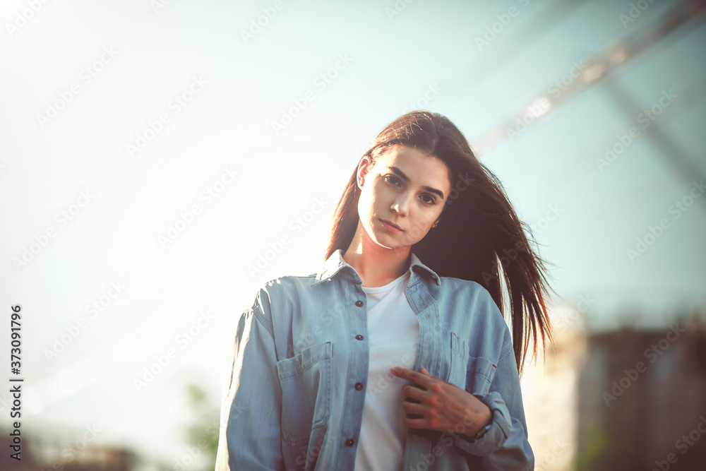 Summer sunny lifestyle fashion portrait. Young stylish hipster woman
