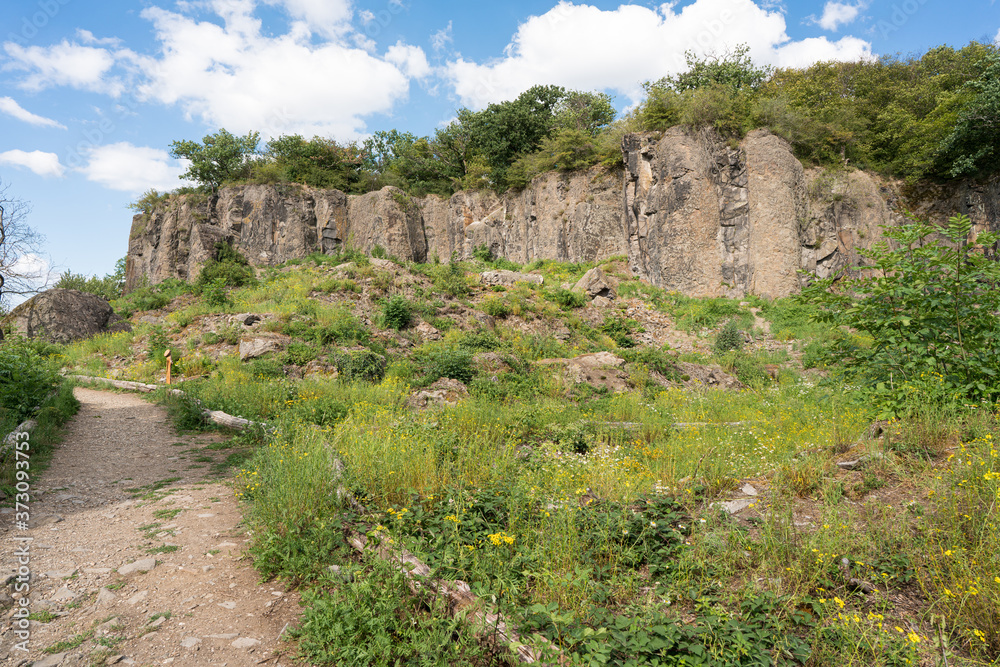 Fototapeta premium Path to a rock wall of the Stenzelberg.