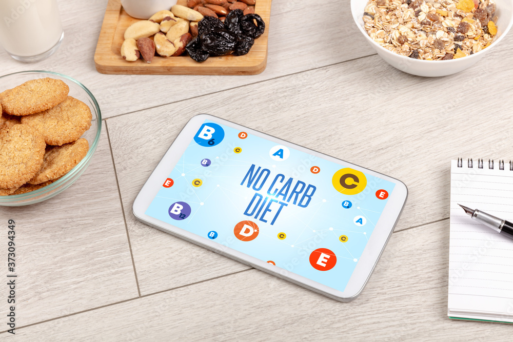 Healthy Tablet Pc compostion with NO CARB DIET inscription, weight loss concept Healthy Tablet Pc compostion with NO CARB DIET inscription, weight loss concept