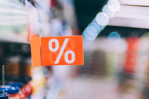 Bright discount label on the shop window.