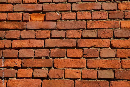 Red brick wall texture. Outdoor. Solid brick walls. Color image