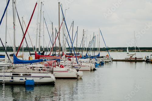 Sailing boats on a lake in Germany on a sunny day with a few clouds. 