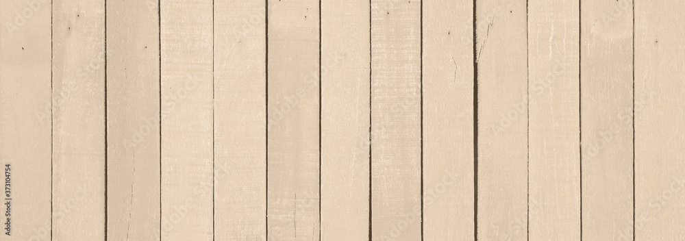 Naklejka premium Light yellow wood grain background derived from natural tree