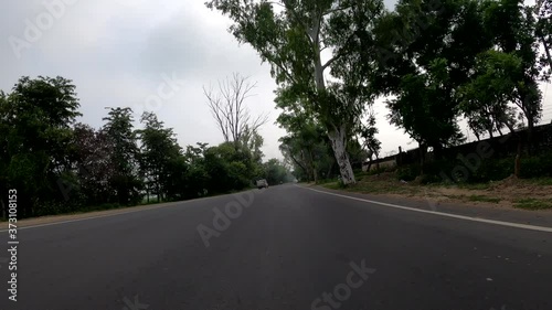 back view of a bike on a large curve
