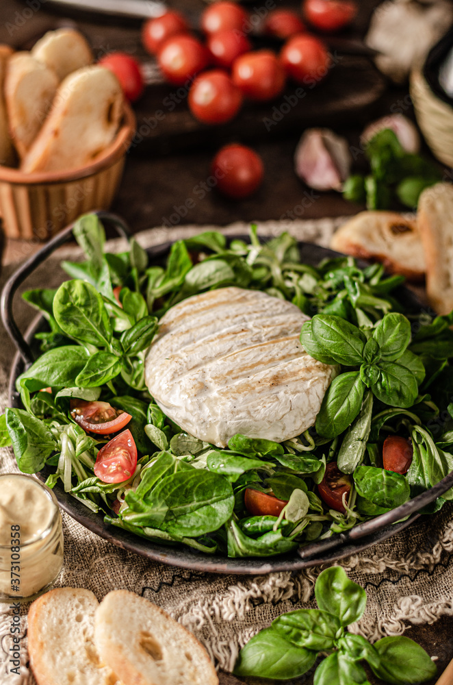 Grilled camembert with delicious salad Grilled camembert with delicious salad