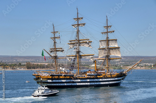 The Amerigo Vespucci training ship of the Italian Navy crosses the navigable canal of Taranto, Puglia, Italy