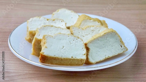 Golden Brown Deep Fried Tofu on White Dish