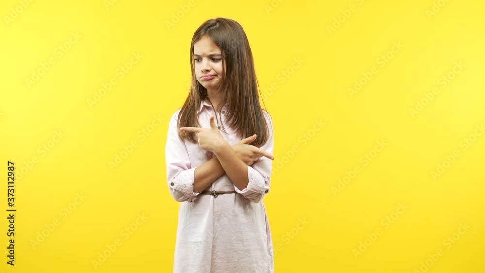 Funny little child girl decide between two options Funny little child girl decide between two options