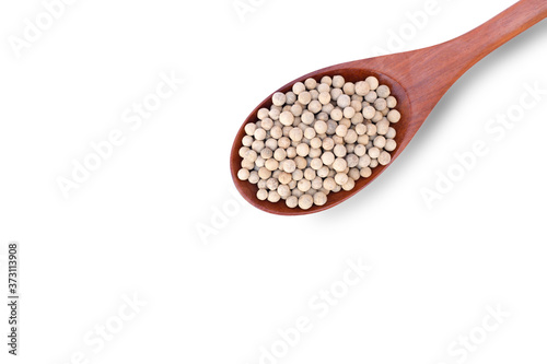 Closeup white pepper seeds or peppercorn ( dried seeds of piper nigrum) in wooden spoon isolated on white background with clipping path. Top view. Flat lay.