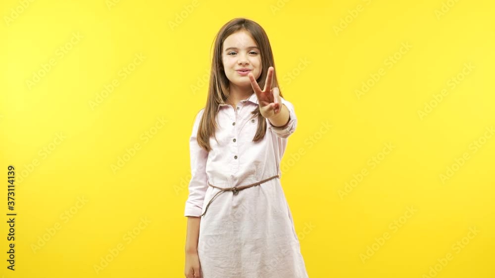 Funny little child girl showing number nine Funny little child girl showing number nine