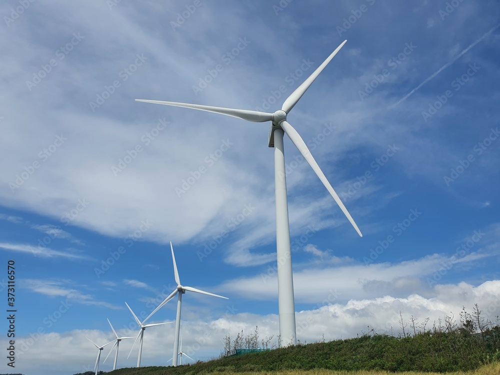 Sinan-gun, Jeollanam-do, South Korea - 26th July 2020 : Scenery of Egi Beach and wind power generator in Sinan-gun Island Sinan-gun, Jeollanam-do, South Korea - 26th July 2020 : Scenery of Egi Beach and wind power generator in Sinan-gun Island