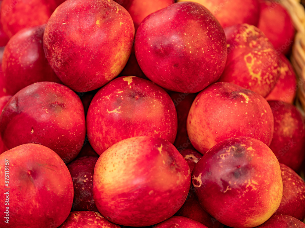a beautiful fragrant ripe nectarine, the view from the top. a beautiful fragrant ripe nectarine, the view from the top.
