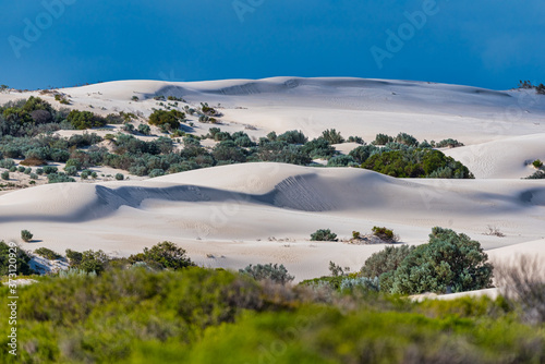 Lancelin is Australia's premier sandboarding destination. Pure white sand rises three storeys high and entry to the dunes is free and open photo