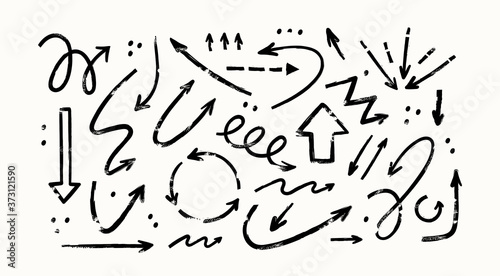 Various Doodle Arrows. Direction pointers. Different shapes. Straight, curly, twisted, dotted and round. Brush stroke style. Grunge texture. Hand drawn Vector set. All elements are isolated