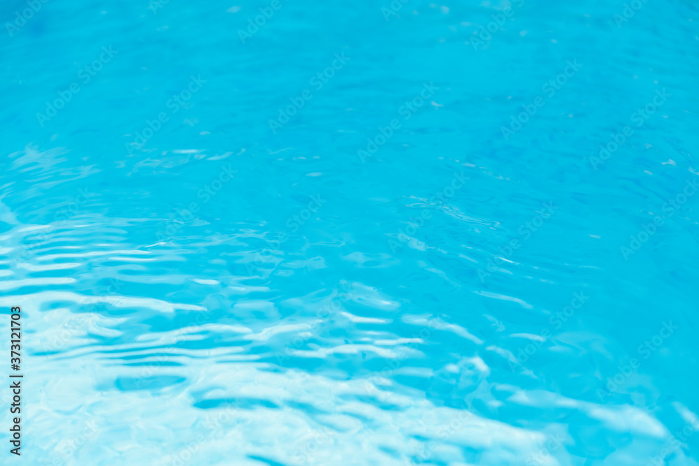 Water waves in the pool with blue background