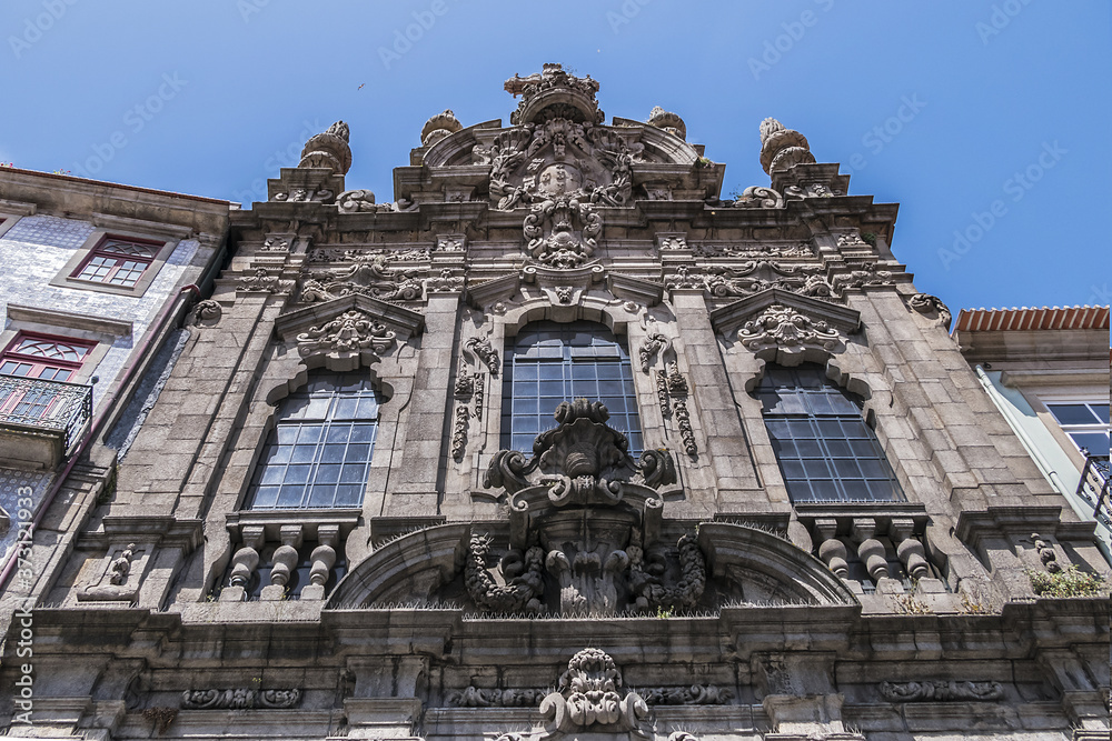 Obraz premium Renaissance and Gothic style Facade of Church of Mercy of Porto (Santa Casa da Misericordia of Porto, XVI century) at Rua das Flores in Porto city. Portugal.