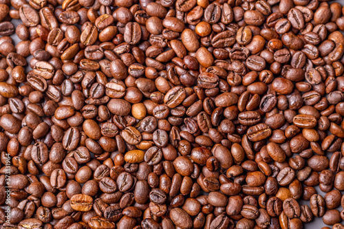 Macro shot of whole bean organic smooth medium dark roast coffee © Игорь Соловьев