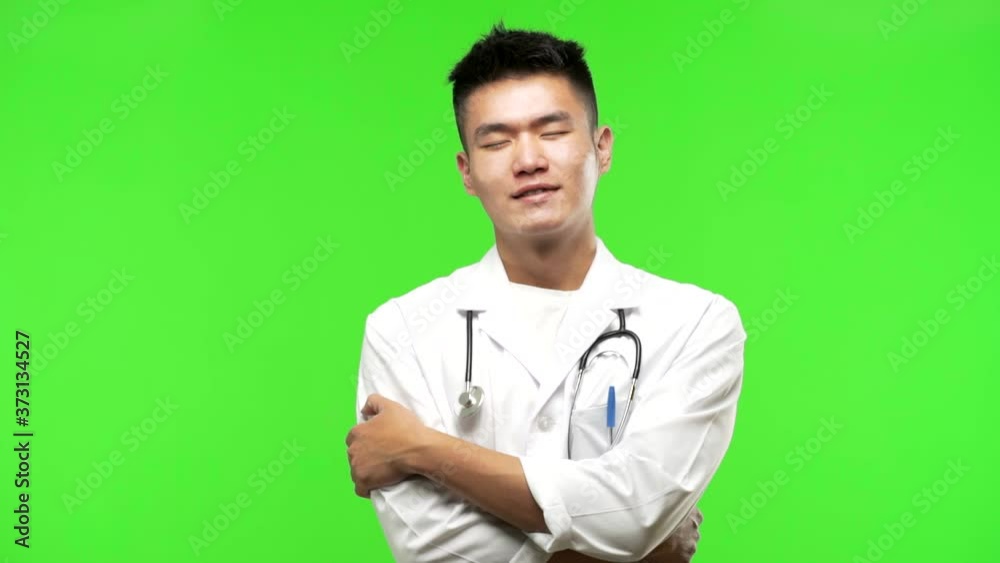 Young chinese doctor man giving a hug Young chinese doctor man giving a hug