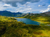 Wonderful Mountain Lake called Tannensee in the Swiss Alps - aerial photography