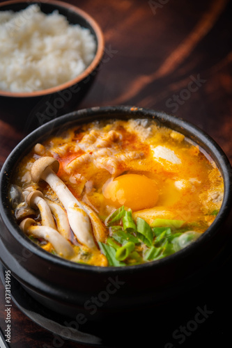 Sundubu, korean hot stone pot with tofu and pork