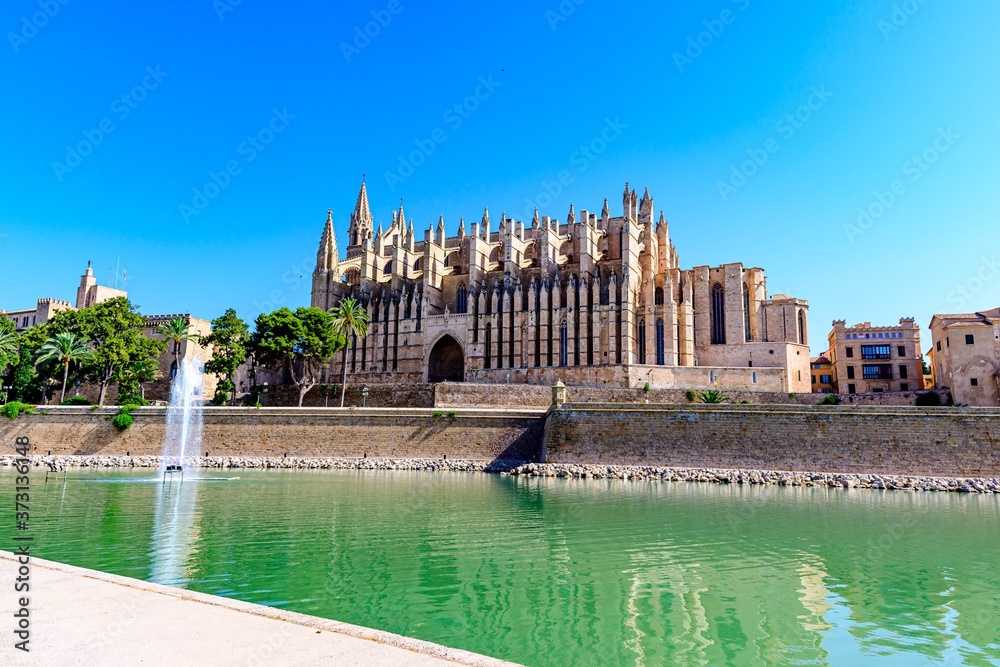 Palma de Mallorca, Spain. Cathedral Church, lake with blue sky