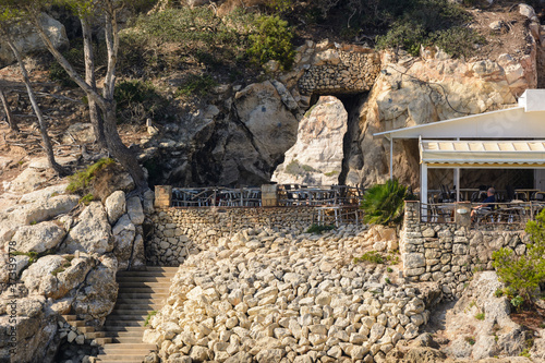 Amazing rocks with window at Cala Galdana beach on the island of Menorca. Spain. photo