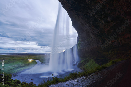 Beautiful view from the side of the Seljalandsfoss waterfall in Iceland