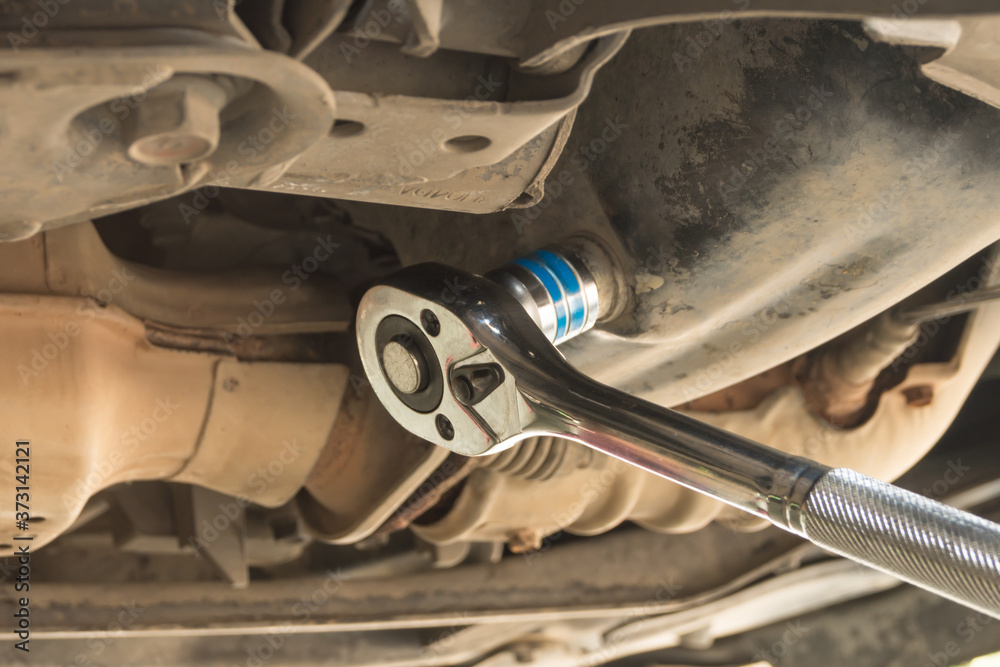 Use screw for car engine maintenance service, Use 19 mm. Wrench to change engine oil.