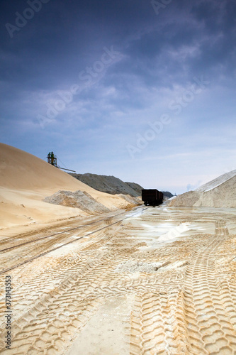 Extraction of alluvial and processing of sand in a sand pit