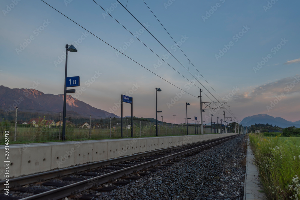 Ledenitzen station on border railway track in south Austria in summer morning