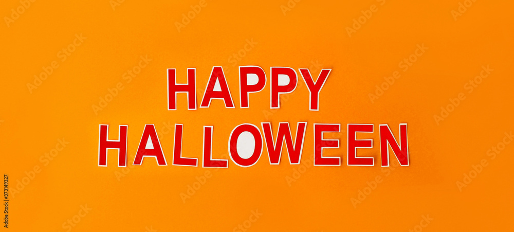 Happy Halloween letters isolated on orange background