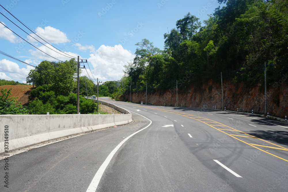 Curvy asphalt road in rural Thailand Curvy asphalt road in rural Thailand