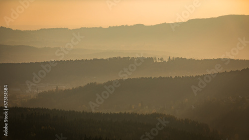 Watching sunset over the forest from Slovanka lookout tower near Janov nad Nisou  Czechia