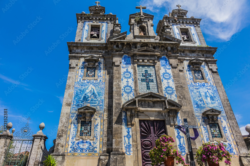 Church of Saint Ildefonso (Igreja de Santo Ildefonso, 1739) near Batalha Square. Porto, Portugal. Facade of azulejo tilework.