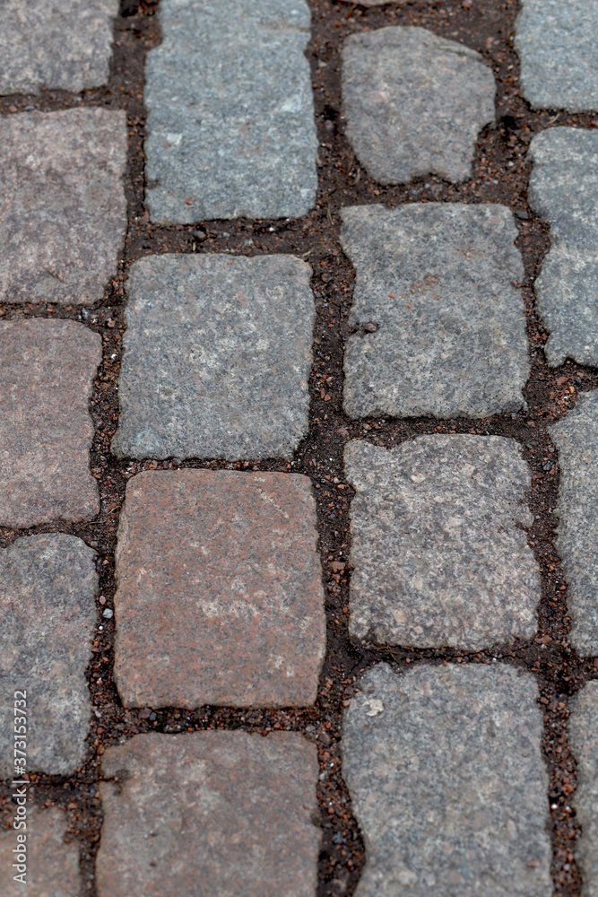 Texture of granite paving stones from the 14th century Texture of granite paving stones from the 14th century